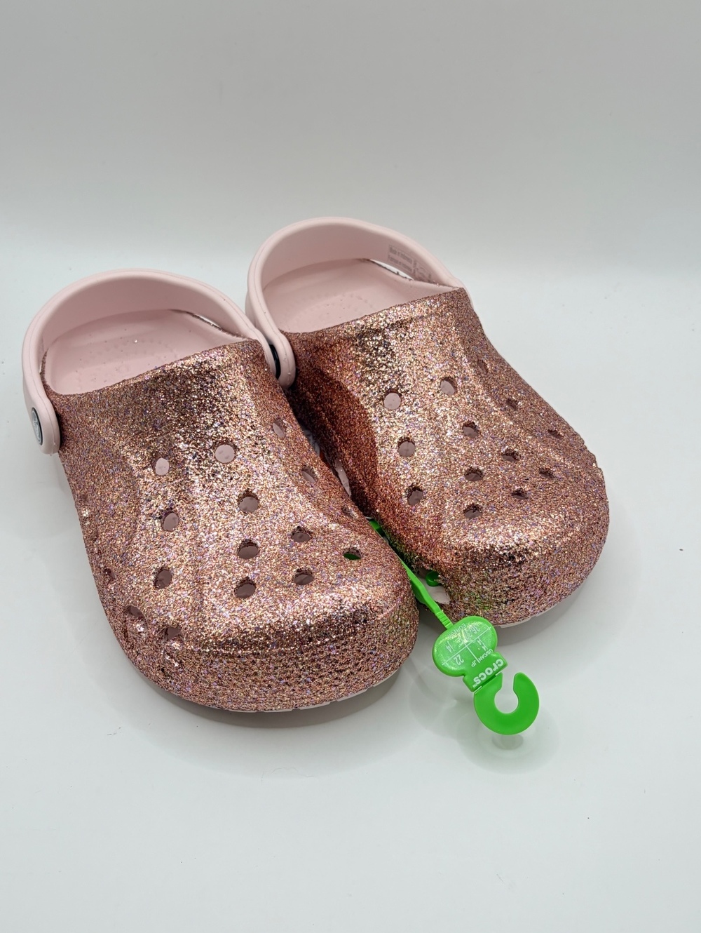 Crocs Classic Glitter Clogs in Pink, junior size J4.